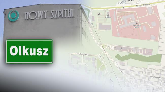 Napis Nowy Szpital na budynku, obok tablica z napisem Olkusz i mapa Olkusza z terenem szpitala